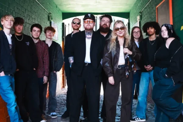 Young people team up w/ Lottery Winner to write hometown anthem